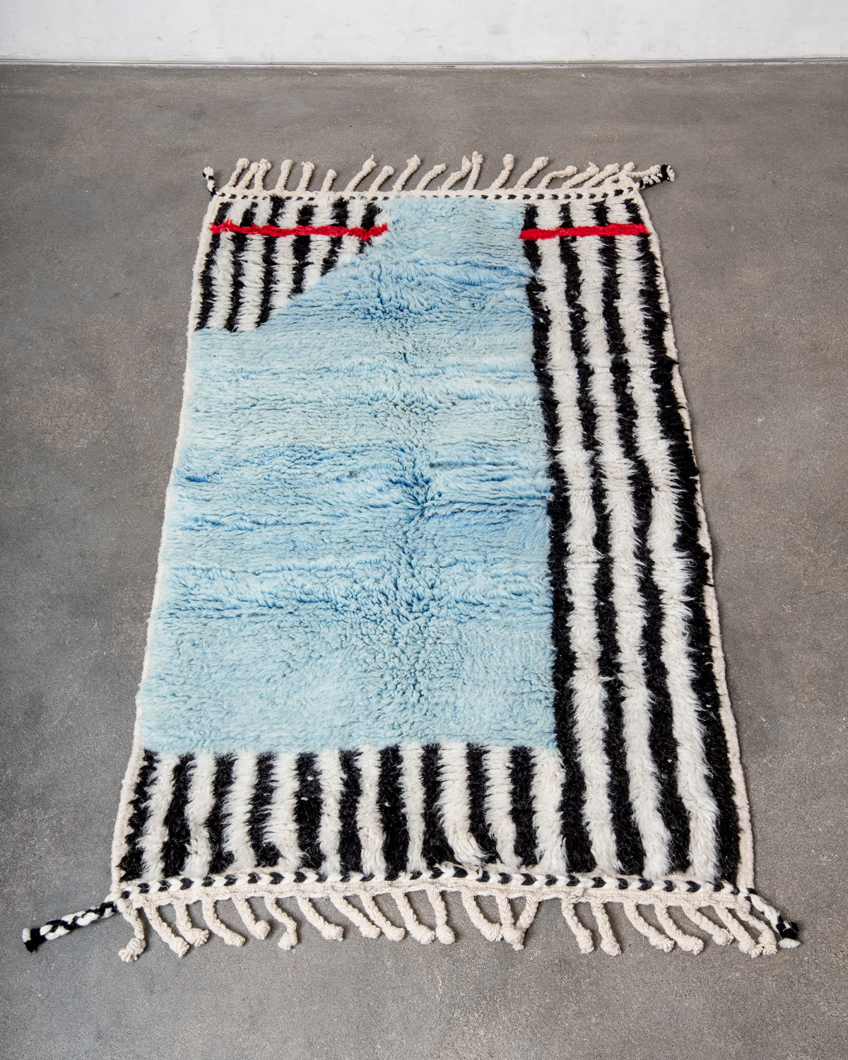 Modern, designer, handcrafted Berber rug from Morocco. Beniourain carpet with beautiful colours and patterns and fluffy wool texture.